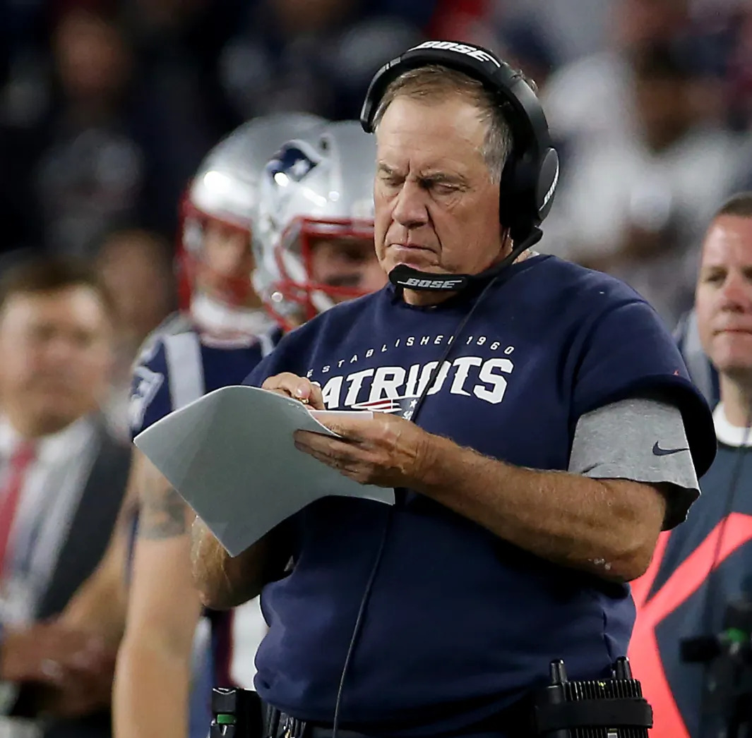 Bill Belichick studying
